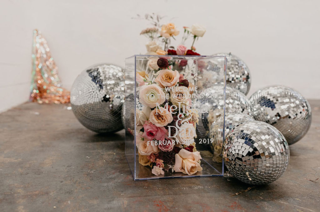 acryl box met bloemen en discoballen photography- Lauren Miles Photo